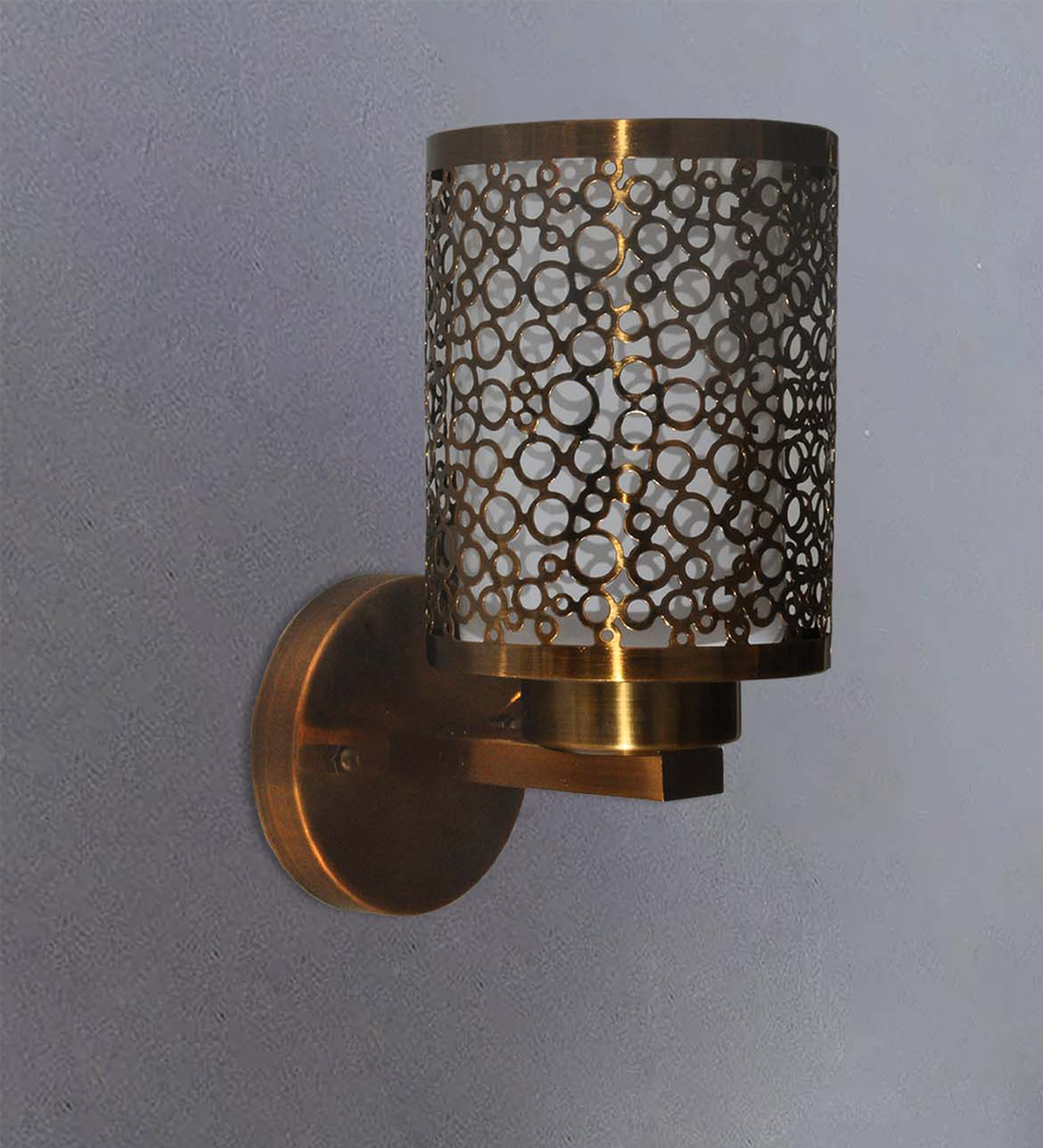 Elevate Your Space with the Circular Trellis Jali Wall Light
